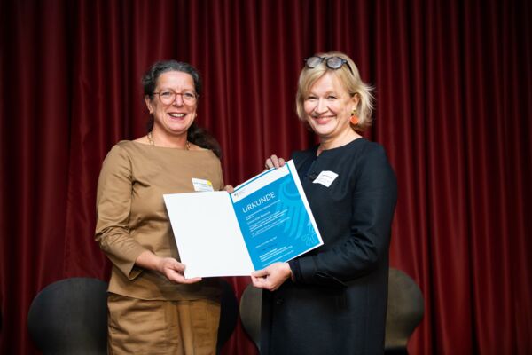 Konferenzfotografie, Veranstaltungsfotograf Urkundenübergabe