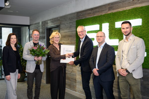 Fotografie für Kundenmagazin - Preisübergabe bei SLT durch KRAVAG